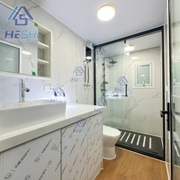Module de vie rectangulaire HeSHi moderne et détachable, type conteneur, avec murs et porte en verre pour usage extérieur