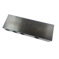 Collecteurs hydrauliques et pneumatiques anodisés en noir usinés CNC personnalisés pour les systèmes d'air en aluminium et les solutions en acier inoxydable
