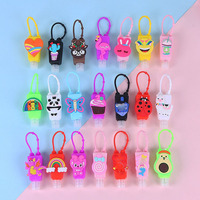 Bouteille de gel alcoolisé en plastique de 1 oz (30 ml) avec porte-clés en silicone de dessin animé, récipient rechargeable pour savon liquide