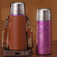 Gobelet isotherme sous vide 600 ml avec revêtement en titane pur, maintien de la chaleur 24h, texture martelée, étui de transport en cuir, logo personnalisé, vente en gros