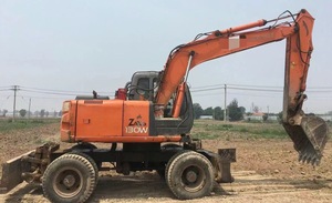 Pintura Original de alta calidad usada Doosan DH130W excavadora de ruedas excavadora usada confiable para la venta - Product Image 2