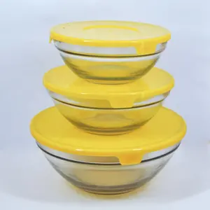 good quality glass salad bowl with yellow plastic lid