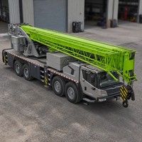 Grue mobile d'occasion 100 tonnes ZTC1000V663 en stock, châssis 8x4, moment de levage 3557kN pour projets d'infrastructure