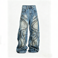 Jean déstructuré pour homme avec fermeture éclair ondulée, patchs, coutures effilochées, patchwork, coupe ample, jambe large, denim, mode streetwear avant-gardiste