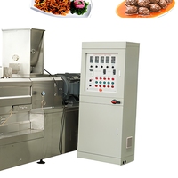 Machine d'extrusion pour la transformation des morceaux de soja et la fabrication d'aliments extrudés