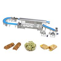 Ligne de production de barres céréalières de bonne qualité, machine à fabriquer des bonbons croquants aux cacahuètes, machine à fabriquer des barres énergétiques et protéinées à vendre
