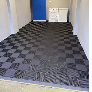 Revêtement de sol en vinyle PVC en plastique à prix d'usine pour atelier de lavage de voiture Carreaux de sol de garage à emboîtement Tapis de sol de garage à eau confinée
