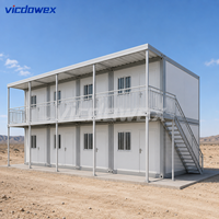 VICDOWEX Maison Conteneur Modulaire Contemporaine Préfabriquée en Panneaux Sandwich en Acier pour Entrepôt, Camp ou Bureau