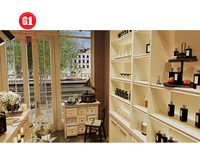 Conception d'intérieur de boutique de parfums sur mesure, présentoir mural moderne pour cosmétiques, présentoir de magasin de parfums sur mesure