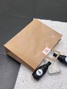 Bolsa de Papel Kraft Marrón Grande al por Mayor con Logotipo Personalizado, Bolsa de Papel para Compras con Asa para Ropa - Product Image 5