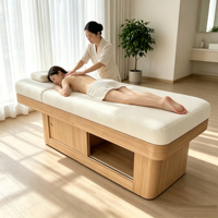 Table de massage élégante sur mesure en cuir PU et bois, style vintage, avec tiroir, pour salon de beauté, spa et bien-être