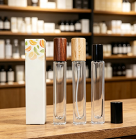 Flacon pulvérisateur rond vide transparent de 10 ml avec bouchons or, argent et noir en stock