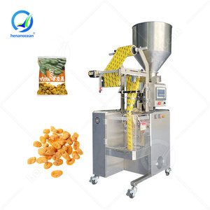 เครื่องบรรจุเม็ดพริกแห้งอุปกรณ์ห่อถั่วลิสงถั่วแบบต่อเนื่องมหาสมุทร - Product Image 1