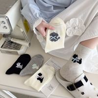 Chaussettes pour femmes de style nouveau - Version légère printemps/été, design mignon avec nœud papillon, thème petit chien, chaussettes mi-mollet sans os