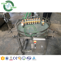 Machine de collecte et de déscramblement de bouteilles carrées pour convoyeur tournant