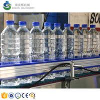 Machine de remplissage et d'embouteillage automatique Sokos pour petites bouteilles en plastique d'eau minérale pure, pour ligne complète de production d'eau