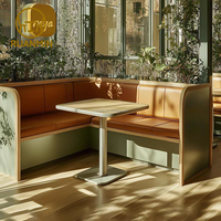 Canapés en forme de L personnalisés avec un espace privé, associés à des tables à cadre en acier inoxydable, sont le choix idéal pour les restaurants