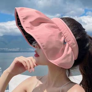 Chapeau de soleil pour femme à large bord avec protection UV, rose, en polyester, pour usage extérieur - Product Image 1