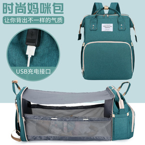 Sac à dos de maternité tendance avec port USB pour voyage et rangement de bébé, en nylon vert, style berceau - Product Image 1
