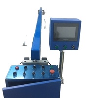 Machine à découper les stores roulants et les rideaux zébrés avec couteau à pression et couteau volant