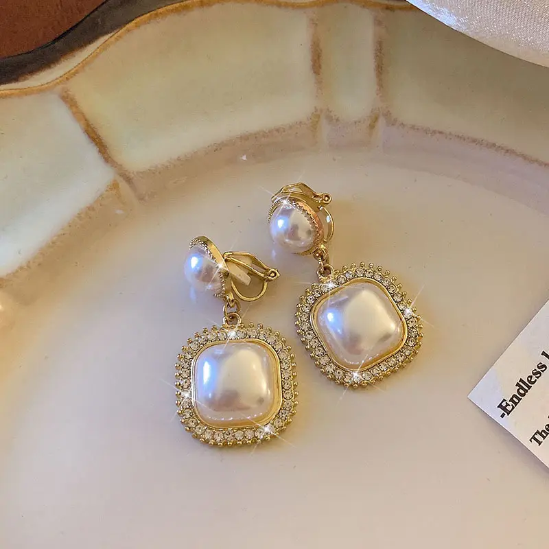 Colgantes de oreja con borla de flor de cristal Vintage, conjunto ovalado dorado, pendientes de diamante sin orificio para oreja, pendientes de clip de oreja de perla