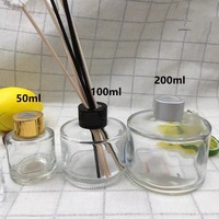 Diffuseur d'arômes en verre rond doré de haute qualité de 50 ml en gros avec bouchon en plastique
