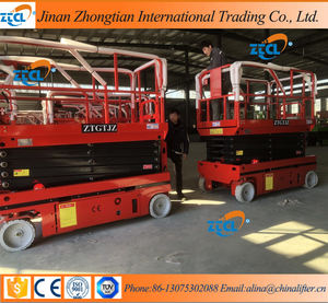 Mendorong sendiri gunting Lift Platform kerja 6-14m platform listrik penuh listrik mendorong sendiri gunting peralatan angkat - Product Image 5