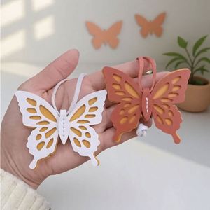 Nouveau porte-clés pendentif papillon ajouré créatif en PU coloré, breloque personnalisée pour sac femme - Product Image 2