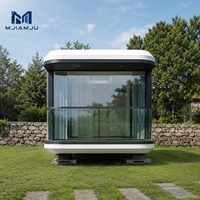 Maison Modulaire de Luxe en Acier MJIAMJU avec Design Moderne, Fenêtres Panoramiques en Verre, Éclairage Intelligent, Garantie 1 An pour Hôtels