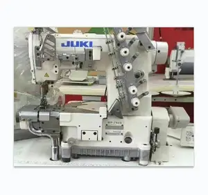 Jukis 7823 Machine à coudre trois aiguilles cinq fils Interlock couverture point Machine à coudre utilisé japon Textile chaîne de tissu 90