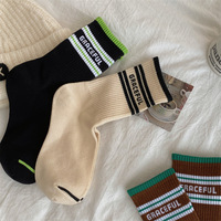 Chaussettes de sport personnalisées de haute qualité, tendance, de marque, à motif jacquard, pour jeunes, en gros