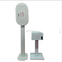 Photomaton ovale DSLR pour iPad avec impression instantanée, boîtier métallique et flight case pour smartphones et appareils photo, idéal pour fêtes, mariages et événements