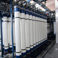 Machinerie de traitement de l'eau, système de membrane UF 100T/H, pompe à moteur contrôlée par PLC, équipement de filtration d'eau par ultrafiltration, 1 an