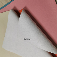 Tissu en cuir PU gaufré litchi couleur unie pastel clair avec support tissé résistant à l'abrasion pour sièges de voiture, canapés et sacs - 0,7-0,8 mm