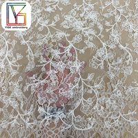 Tissu de dentelle de mariée en tulle blanc élégant avec broderie Chantilly, tissu de dentelle de luxe français en maille à cils et sequins pour robe de mariée