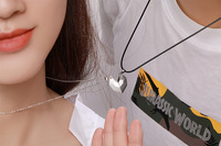 Collier pour hommes et femmes, chaîne avec cœur d'amour, en pierre magnétique, bijou de couple, nouvelle mode,