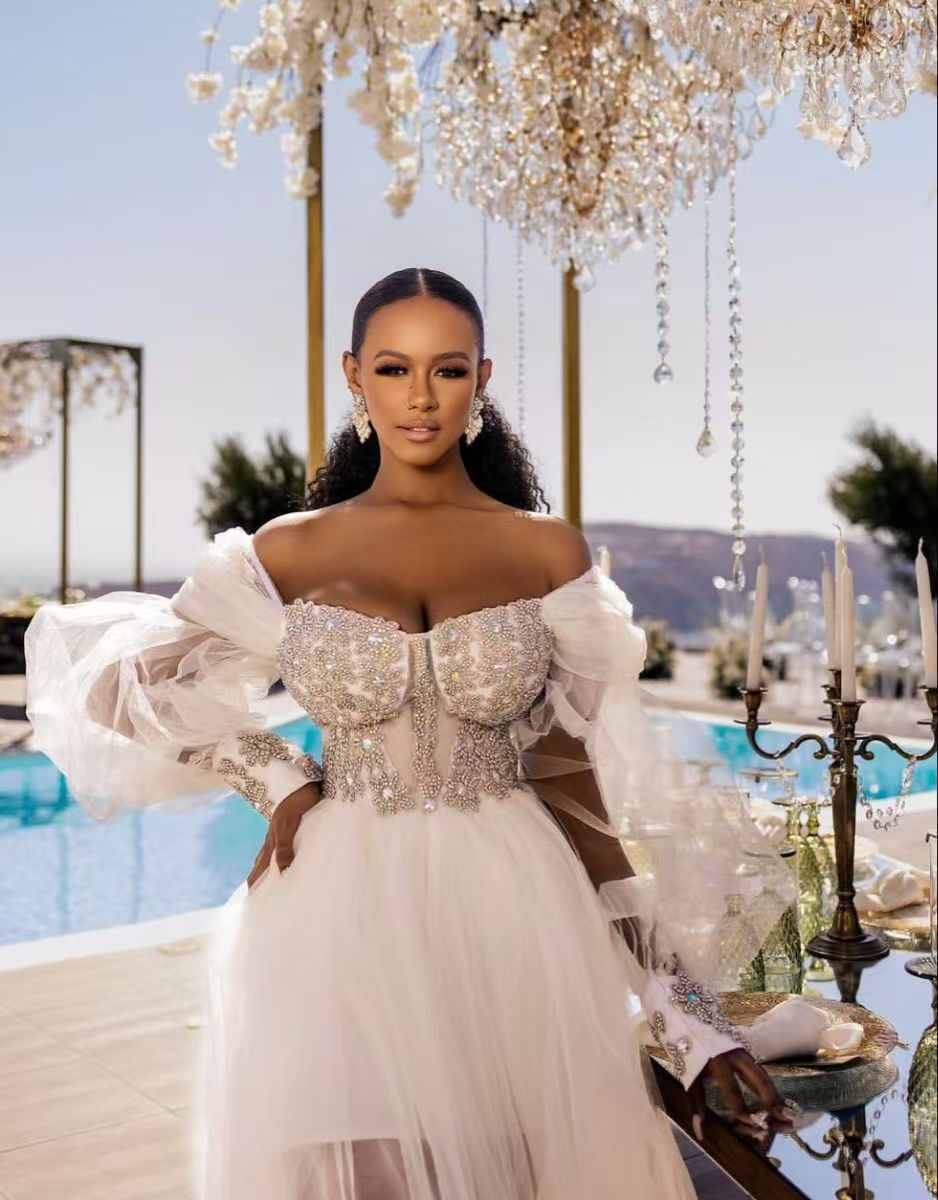 Ivory Wedding Dress With Sweetheart Neckline, Long Sleeve, And Sweep Train Made Of Appliqued Polyester For Modern Beach Brides Featuring Beading, Ivory Wedding Dress With Sweetheart Neckline, Long Sleeve, And Sweep Train Made Of Appliqued Polyester For Modern Beach Brides Featuring Beading,