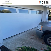 Porte de garage en acier coloré résistant au vent MULTISHADES avec noyau en mousse PU et moteur central pour une sécurité ultime