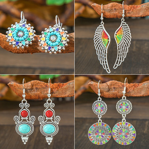 Pendientes de moda étnica con diseño floral, hechos a mano, en tono plateado, longitud regular, accesorio para las cuatro estaciones, joyería para mujer - Product Image 1