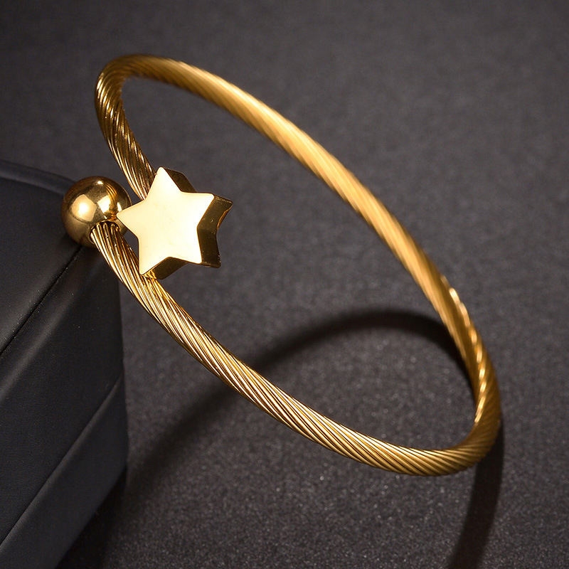 Bracelet étoile à cinq branches doré