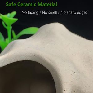 Decoración de tanque de cerámica Acuario decorado con roca <span class=keywords><strong>Betta</strong></span> Fish pecera pequeña escondite agujeros, <span class=keywords><strong>juguetes</strong></span> de <span class=keywords><strong>peces</strong></span> <span class=keywords><strong>Betta</strong></span> en forma de olla - Product Image 3