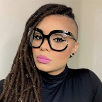 Lunettes anti-lumière bleue tendance avec monture ronde, forme concave bleue et transparente pour les photos de rue