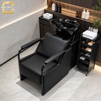 Fauteuil de lavage inclinable avec bac en céramique noir et revêtement en cuir PU confortable pour salon de coiffure et institut de beauté