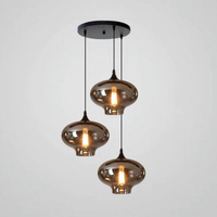 Vente en gros de lampes suspendues boule de verre pour cuisine de restaurant noir simple lustre en verre chromé pour restaurant