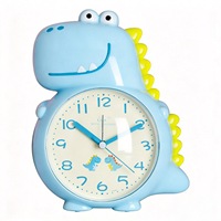 Dinosaurier-förmiger Tisch-Wecker, mit Wechselbarer Melodie & Simulierter Klingel, Schlummerfunktion & Nachtlicht, Niedlich und Vielseitig für Kinder