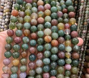 Vente en gros de <span class=keywords><strong>pierre</strong></span> naturelle 4/6/8mm Agate Oeil de tigre rouge perles rondes en vrac semi-finies Bracelet à bricoler soi-même Accessoires de bijouterie - Product Image 5