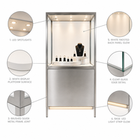 Vitrines à bijoux minimalistes de luxe, disponibles en couleurs personnalisées, idéales pour les centres commerciaux haut de gamme et les bijouteries.
