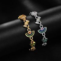 Bracelet Hip Hop multi-breloques en cuivre incrusté de zircone cubique, avec pendentifs cœur, bonbon et œil, chaîne style Iced Out Bling, bijoux unisexe, vente en gros