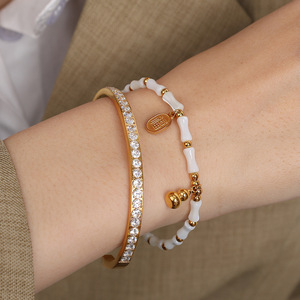 สร้อยข้อมือเหล็กไทเทเนียมประดับเปลือกหอยสีขาว เปลือกหอยธรรมชาติ สีทอง ของขวัญเครื่องประดับสำหรับทุกเพศ - Product Image 4