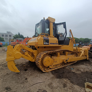 รถดันดินตีนตะขาบ Komatsu D65 EX มือสองจากญี่ปุ่น ใช้เครื่องยนต์ SAA6D114E ขนาดกลาง พร้อมริปเปอร์ สำหรับงานก่อสร้างและปรับระดับพื้นดิน - Product Image 1